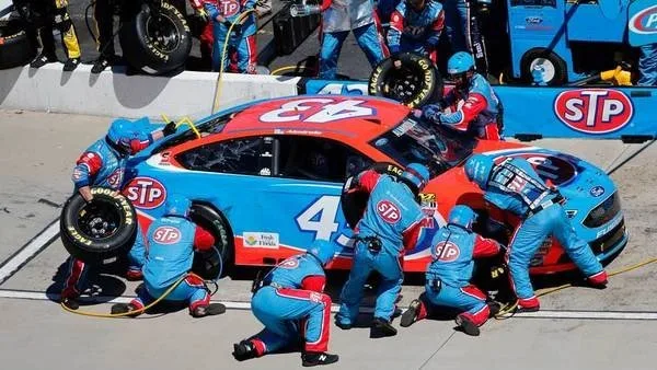 Pit crew in a pit stop