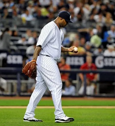 Player wearing long custom baseball pants