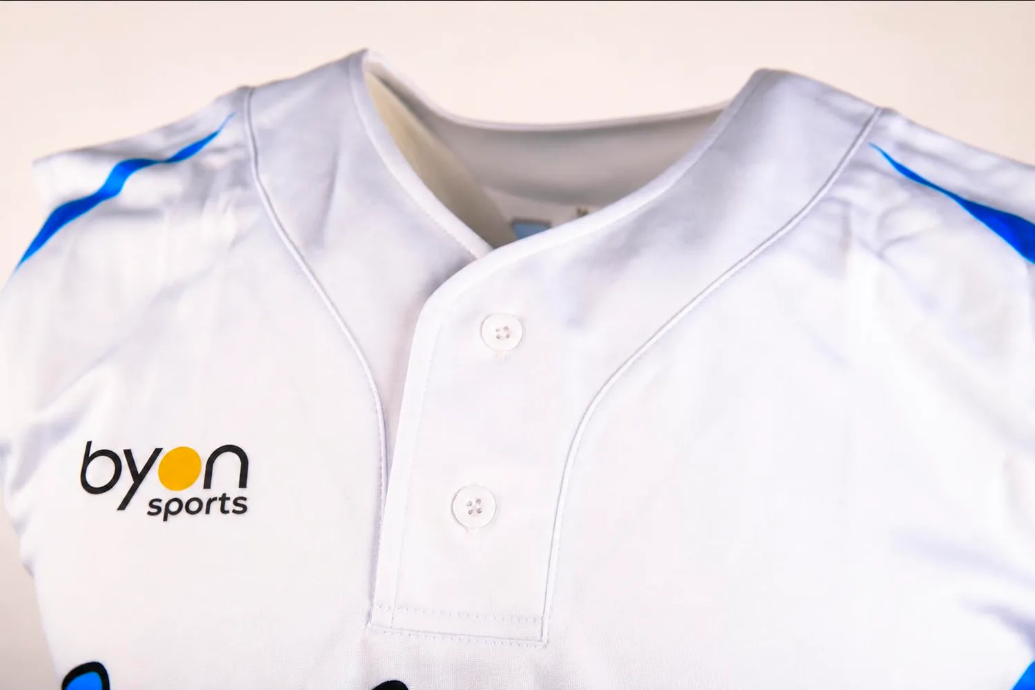 Buttons on a custom sleeveless baseball jersey