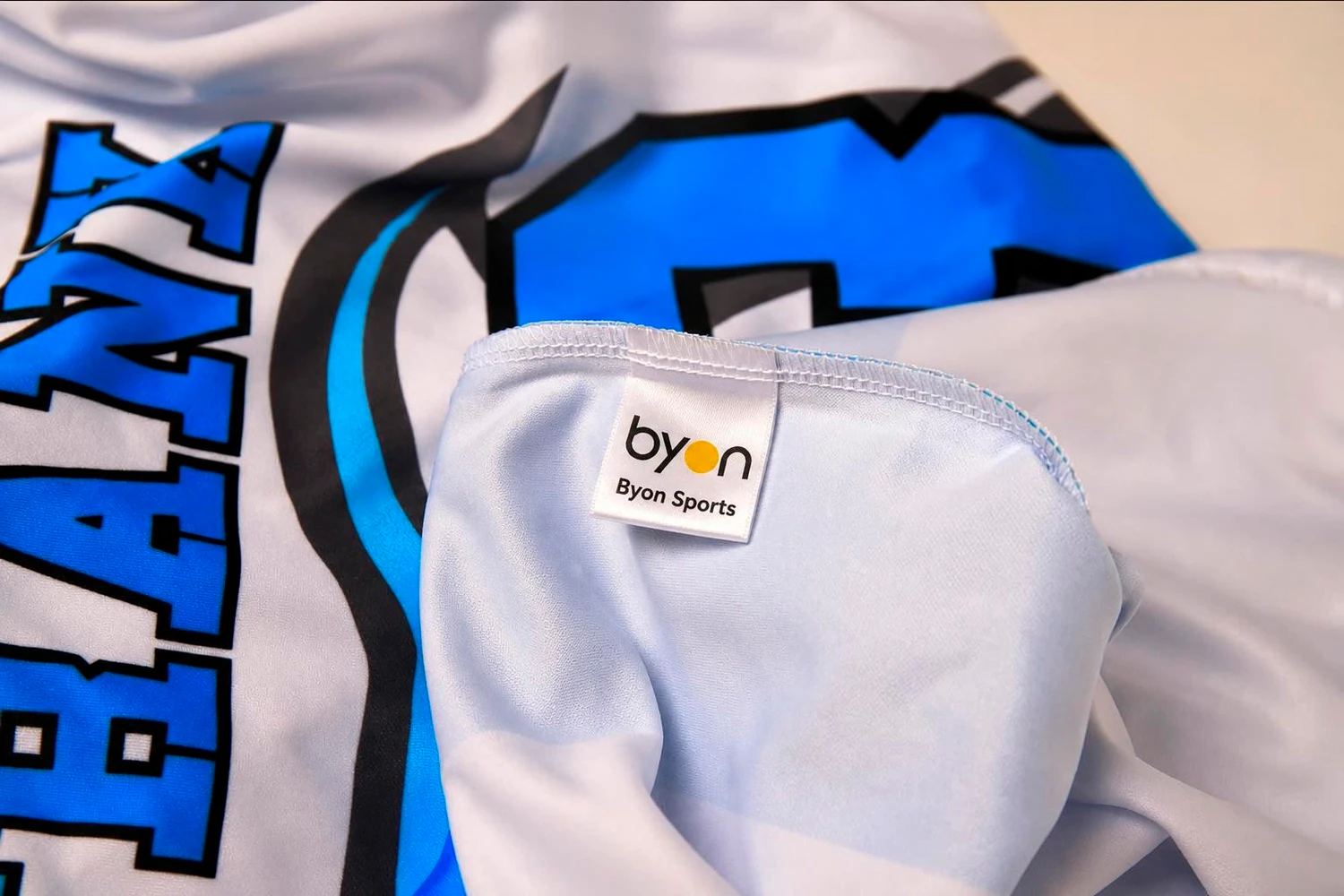 Wash label on a custom sleeveless baseball jersey